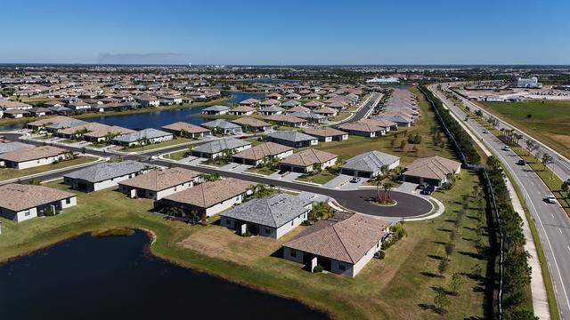 Many Florida residents feel that rapid development is overwhelming infrastructure and threatening quality of life and the environment. But developers and state agencies are using a law known as SB 180 to block local attempts to slow down and more thoughtfully plan growth. Pictured are new homes in Lakewood Ranch in Manatee County on Nov. 3, 2025.